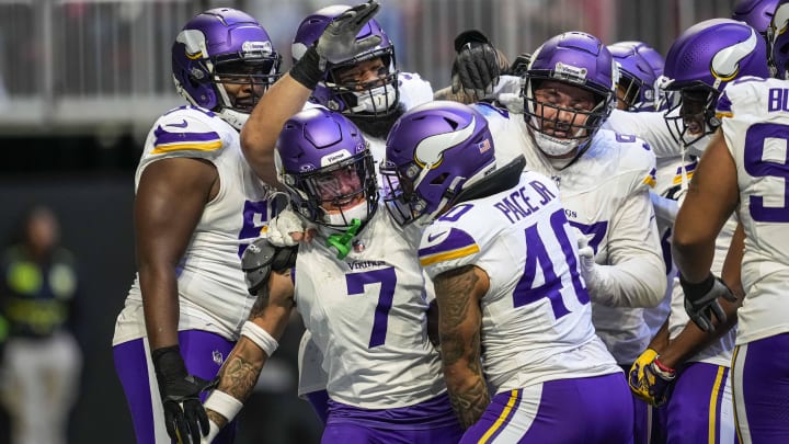 Nov 5, 2023; Atlanta, Georgia, USA; Minnesota Vikings cornerback Byron Murphy Jr. (7) reacts with teammates after making an interception against the Atlanta Falcons during the second half at Mercedes-Benz Stadium.