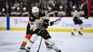 Nov 2, 2024; Philadelphia, Pennsylvania, USA; Boston Bruins right wing David Pastrnak (88) controls the puck against the Philadelphia Flyers in the first period at Wells Fargo Center. Mandatory Credit: Kyle Ross-Imagn Images