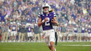 Kansas State quarterback Avery Johnson (2) scores a touchdown against Rutgers during first half of the Rate Bowl at Chase Field on Dec. 26, 2024, in Phoenix.