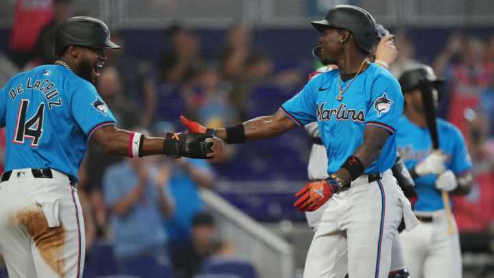 Apr 28, 2024; Miami, Florida, USA;  Miami Marlins center fielder Jazz Chisholm Jr. (2) celebrates a grand slam in the first inning against the Washington Nationals with left fielder Bryan De La Cruz (14) at loanDepot Park. Mandatory Credit: Jim Rassol-USA TODAY Sports