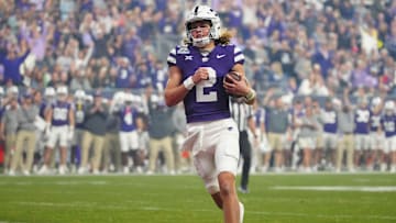 Kansas State quarterback Avery Johnson (2) scores a touchdown against Rutgers during first half of the Rate Bowl at Chase Field on Dec. 26, 2024, in Phoenix.