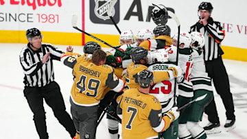 Apr 22, 2025; Las Vegas, Nevada, USA; Vegas Golden Knights players scuffle with Minnesota Wild players during the third period of game two of the first round of the 2025 Stanley Cup Playoffs at T-Mobile Arena. Mandatory Credit: Stephen R. Sylvanie-Imagn Images