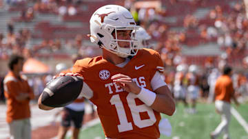 Texas Longhorns quarterback Arch Manning warms up before the game against the Mississippi State Bulldogs 