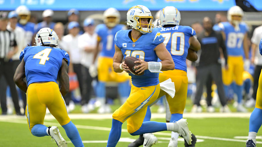 Sep 8, 2024; Inglewood, California, USA; Los Angeles Chargers quarterback Justin Herbert (10) looks to pass in the first half against the Las Vegas Raiders at SoFi Stadium. Mandatory Credit: Jayne Kamin-Oncea-Imagn Images | Jayne Kamin-Oncea-Imagn Images