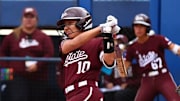 Mississippi State Bulldogs third baseman Nadia Barbary takes a swing against the Oklahoma Sooners at Devon Park in Oklahoma City, Okla.