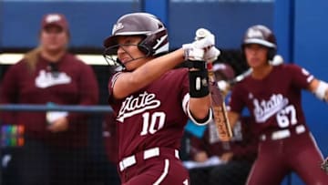 Mississippi State Bulldogs third baseman Nadia Barbary takes a swing against the Oklahoma Sooners at Devon Park in Oklahoma City, Okla.