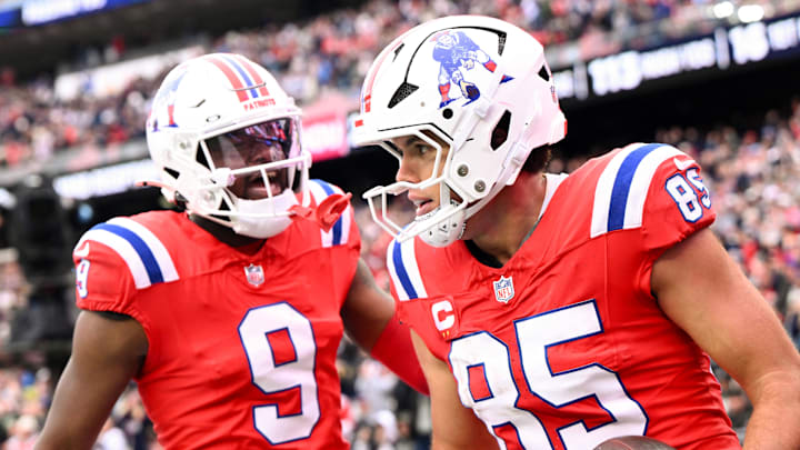 Oct 13, 2024; Foxborough, Massachusetts, USA; New England Patriots tight end Hunter Henry (85) celebrates with wide receiver Kayshon Boutte (9) after scoring a touchdown against the Houston Texans during the second half at Gillette Stadium. Mandatory Credit: Brian Fluharty-Imagn Images
