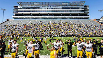 Apr 26, 2025; Iowa City, IA, USA; Iowa Hawkeyes players wave to patients in the Stead Family Children’s Hospital during a spring NCAA football open practice at Kinnick Stadium. Mandatory Credit: Joseph Cress-The Des Moines Register