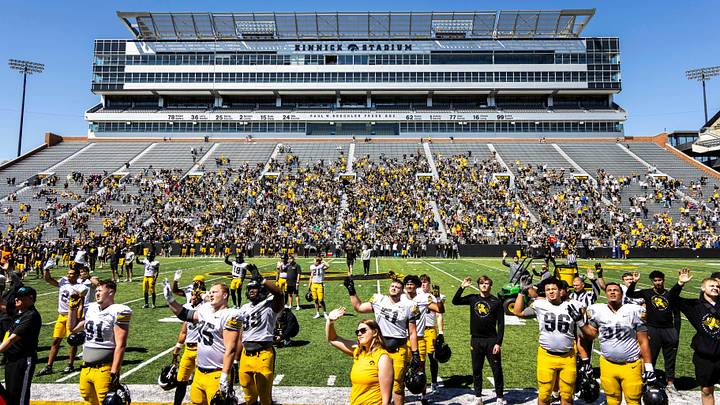 Apr 26, 2025; Iowa City, IA, USA; Iowa Hawkeyes players wave to patients in the Stead Family Children’s Hospital during a spring NCAA football open practice at Kinnick Stadium. Mandatory Credit: Joseph Cress-The Des Moines Register