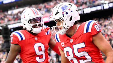 Oct 13, 2024; Foxborough, Massachusetts, USA; New England Patriots tight end Hunter Henry (85) celebrates with wide receiver Kayshon Boutte (9) after scoring a touchdown against the Houston Texans during the second half at Gillette Stadium. Mandatory Credit: Brian Fluharty-Imagn Images