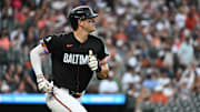 Baltimore Orioles first baseman Coby Mayo (16) hits a solo home run during the second inning against the Colorado Rockies at Oriole Park at Camden Yards. 