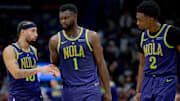 Jan 7, 2025; New Orleans, Louisiana, USA; New Orleans Pelicans guard Jose Alvarado (15), forward Zion Williamson (1), and forward Herbert Jones (2) react during the second half against the Minnesota Timberwolves at Smoothie King Center. Mandatory Credit: Matthew Hinton-Imagn Images