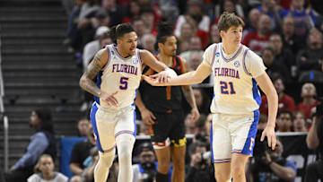 Mar 27, 2025; San Francisco, CA, USA; Florida Gators guard Will Richard (5) and forward Alex Condon (21) high-five during the second half against the Maryland Terrapins during a West Regional semifinal of the 2025 NCAA tournament at Chase Center. Mandatory Credit: Eakin Howard-Imagn Images