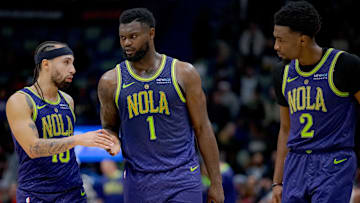 Jan 7, 2025; New Orleans, Louisiana, USA; New Orleans Pelicans guard Jose Alvarado (15), forward Zion Williamson (1), and forward Herbert Jones (2) react during the second half against the Minnesota Timberwolves at Smoothie King Center. Mandatory Credit: Matthew Hinton-Imagn Images