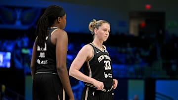 Aug 8, 2025; Arlington, Texas, USA; New York Liberty center Jonquel Jones (35) and center Emma Meesseman (33) in action during the game between the Dallas Wings and the New York Liberty at College Park Center. Mandatory Credit: Jerome Miron-Imagn Images
