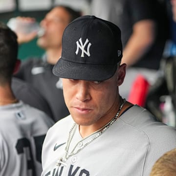 Jun 12, 2025; Kansas City, Missouri, USA; New York Yankees right fielder Aaron Judge (99) looks on in the dugout against the Kansas City Royals during the third inning at Kauffman Stadium. Mandatory Credit: Denny Medley-Imagn Images