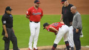 Jul 24, 2024; Cleveland, Ohio, USA; Cleveland Guardians starting pitcher Tanner Bibee (28) stretches beside manager Stephen Vogt (12) and pitching coach Carl Willis (51) before leaving the game in the fifth inning against the Detroit Tigers at Progressive Field. Mandatory Credit: David Richard-USA TODAY Sports