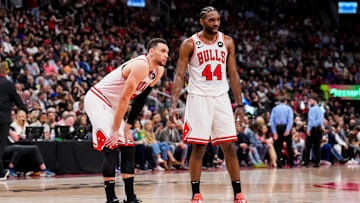 Zach LaVine and Patrick Williams of the Chicago Bulls look on during an NBA game against the Toronto Raptors.