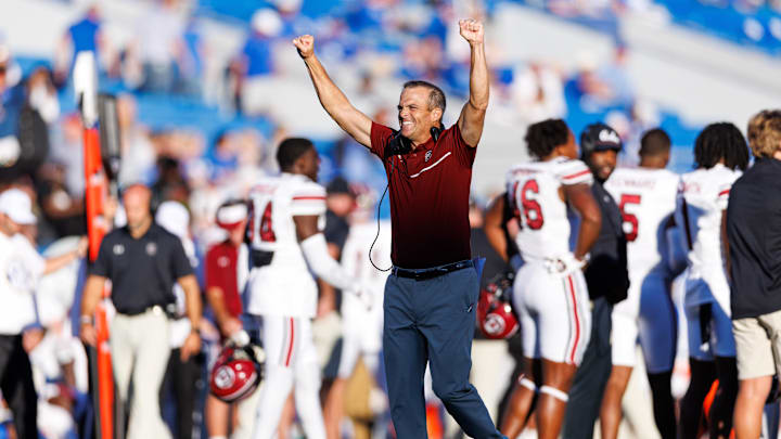 Sep 7, 2024; Lexington, Kentucky, USA; South Carolina Gamecocks head coach Shane Beamer celebrates during the fourth quarter against the Kentucky Wildcats at Kroger Field. Mandatory Credit: Jordan Prather-Imagn Images