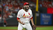 Sep 17, 2024; St. Louis, Missouri, USA;  St. Louis Cardinals starting pitcher Lance Lynn (31) reacts after inning ending double play against the Pittsburgh Pirates during the fifth inning at Busch Stadium. Mandatory Credit: Jeff Curry-Imagn Images