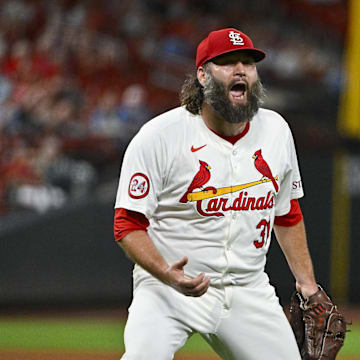 Sep 17, 2024; St. Louis, Missouri, USA;  St. Louis Cardinals starting pitcher Lance Lynn (31) reacts after inning ending double play against the Pittsburgh Pirates during the fifth inning at Busch Stadium. Mandatory Credit: Jeff Curry-Imagn Images