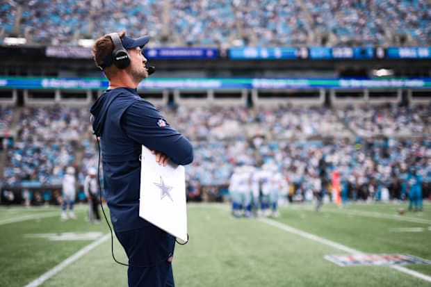 Dallas Cowboys head coach Brian Schottenheimer looks on from the sideline during the first quarter against the Carolina Panth
