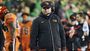 Nov 24, 2023; Eugene, Oregon, USA; Oregon State Beavers head coach Jonathan Smith watches a player being attended to during the second half against the Oregon Ducks at Autzen Stadium. Mandatory Credit: Troy Wayrynen-Imagn Images