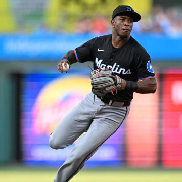 Jun 27, 2024; Philadelphia, Pennsylvania, USA; Miami Marlins infielder Tim Anderson (7) fields a ground ball against the Philadelphia Phillies in the second inning at Citizens Bank Park.