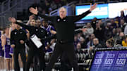 Dec 14, 2023; Milwaukee, Wisconsin, USA;  St. Thomas (MN) Tommies head coach Johnny Tauer celebrates a call during the second half against the Marquette Golden Eagles at Fiserv Forum. Mandatory Credit: Jeff Hanisch-Imagn Images
