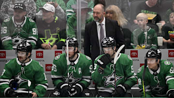 Apr 12, 2025; Dallas, Texas, USA; Dallas Stars head coach Pete DeBoer  looks on during the first period against the Utah Hockey Club at the American Airlines Center. Mandatory Credit: Jerome Miron-Imagn Images
