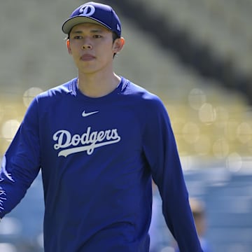 Jun 19, 2025; Los Angeles, California, USA;  Los Angeles Dodgers starting pitcher Roki Sasaki (11)
