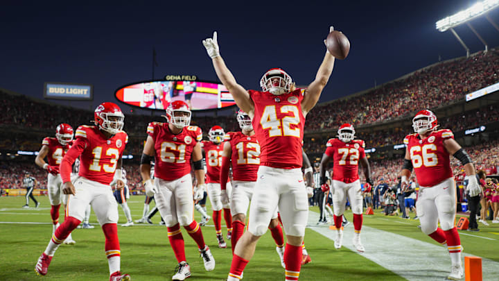 Aug 22, 2024; Kansas City, Missouri, USA; Kansas City Chiefs running back Carson Steele (42) celebrates with teammates after scoring a touchdown during the first half against the Chicago Bears at GEHA Field at Arrowhead Stadium. The touchdown would be called back. Mandatory Credit: Jay Biggerstaff-Imagn Images