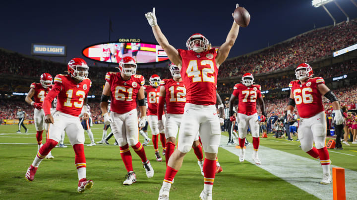 Aug 22, 2024; Kansas City, Missouri, USA; Kansas City Chiefs running back Carson Steele (42) celebrates with teammates after scoring a touchdown during the first half against the Chicago Bears at GEHA Field at Arrowhead Stadium. The touchdown would be called back. Mandatory Credit: Jay Biggerstaff-USA TODAY Sports