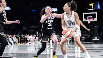 May 29, 2025; Brooklyn, New York, USA; Golden State Valkyries forward Janelle Salaun (13) looks to pass the ball as New York Liberty forward Breanna Stewart (30) defends during the first half at Barclays Center. Mandatory Credit: John Jones-Imagn Images