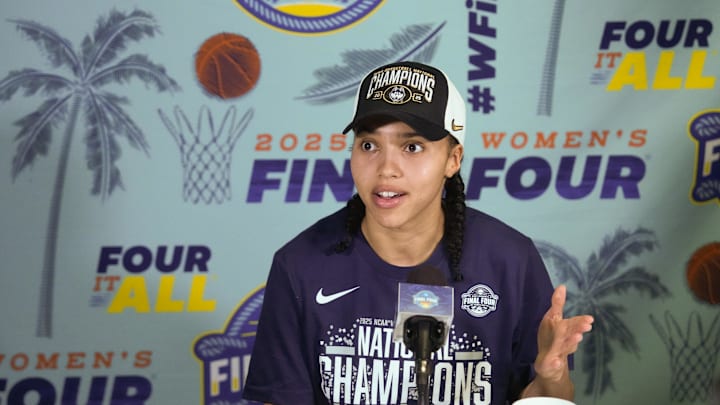 Apr 6, 2025; Tampa, FL, USA; Connecticut Huskies guard Azzi Fudd (35) speaks to the media after the national championship of the women's 2025 NCAA tournament against the South Carolina Gamecocks at Amalie Arena. Mandatory Credit: Kirby Lee-Imagn Images