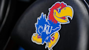 Nov 16, 2024; Lawrence, Kansas, USA; A general view of the Kansas Jayhawks logo on a bench chair prior to a game against the Oakland Golden Grizzlies at Allen Fieldhouse. Mandatory Credit: Denny Medley-Imagn Images
