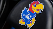 Nov 16, 2024; Lawrence, Kansas, USA; A general view of the Kansas Jayhawks logo on a bench chair prior to a game against the Oakland Golden Grizzlies at Allen Fieldhouse. Mandatory Credit: Denny Medley-Imagn Images