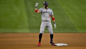 Royce Lewis celebrates a double