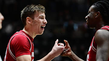 Feb 15, 2025; West Lafayette, Indiana, USA; Wisconsin Badgers guard Jack Janicki (33) celebrates with guard John Blackwell (25) after defeating the Purdue Boilermakers at Mackey Arena. Mandatory Credit: Marc Lebryk-Imagn Images