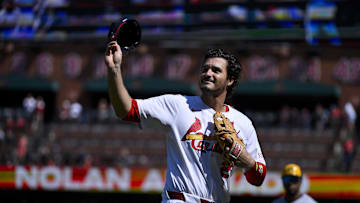 Sep 21, 2025; St. Louis, Missouri, USA; St. Louis Cardinals third baseman Nolan Arenado (28) salutes the fans after he was ceremonially removed before the start of the first inning against the Milwaukee Brewers at Busch Stadium. Mandatory Credit: Jeff Curry-Imagn Images