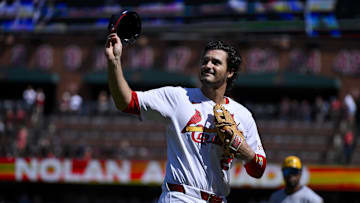 Sep 21, 2025; St. Louis, Missouri, USA; St. Louis Cardinals third baseman Nolan Arenado (28) salutes the fans after he was ceremonially removed before the start of the first inning against the Milwaukee Brewers at Busch Stadium. Mandatory Credit: Jeff Curry-Imagn Images
