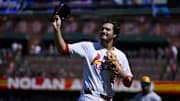 Sep 21, 2025; St. Louis, Missouri, USA; St. Louis Cardinals third baseman Nolan Arenado (28) salutes the fans after he was ceremonially removed before the start of the first inning against the Milwaukee Brewers at Busch Stadium. Mandatory Credit: Jeff Curry-Imagn Images