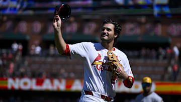 Sep 21, 2025; St. Louis, Missouri, USA; St. Louis Cardinals third baseman Nolan Arenado (28) salutes the fans after he was ceremonially removed before the start of the first inning against the Milwaukee Brewers at Busch Stadium. Mandatory Credit: Jeff Curry-Imagn Images