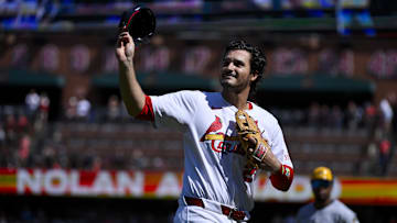 Sep 21, 2025; St. Louis, Missouri, USA; St. Louis Cardinals third baseman Nolan Arenado (28) salutes the fans after he was ceremonially removed before the start of the first inning against the Milwaukee Brewers at Busch Stadium. Mandatory Credit: Jeff Curry-Imagn Images