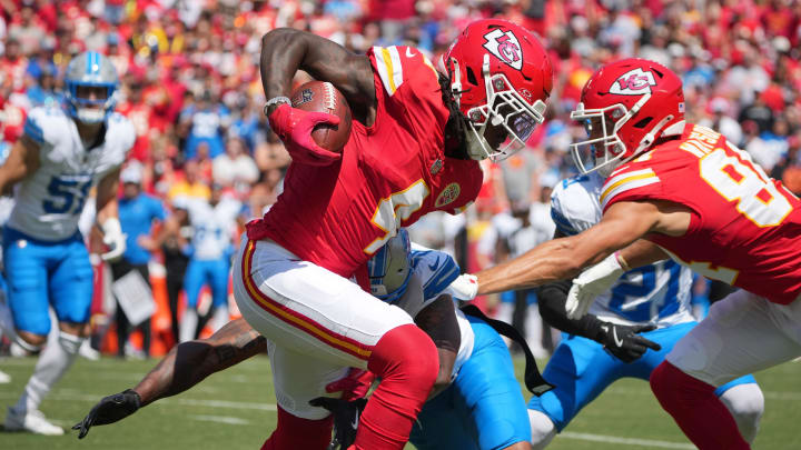 Aug 17, 2024; Kansas City, Missouri, USA; Kansas City Chiefs wide receiver Rashee Rice (4) runs the ball as Detroit Lions cornerback Khalil Dorsey (30) defends during the first half at GEHA Field at Arrowhead Stadium. Mandatory Credit: Denny Medley-USA TODAY Sports