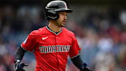Apr 13, 2025; Cleveland, Ohio, USA; Cleveland Guardians left fielder Steven Kwan (38) runs to first base after hitting a single during the ninth inning against the Kansas City Royals at Progressive Field. Mandatory Credit: David Dermer-Imagn Images