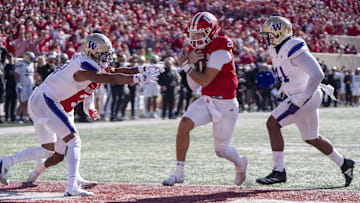 Oct 26, 2024; Bloomington, Indiana, USA; Indiana Hoosiers quarterback Tayven Jackson (2) runs the ball for a touchdown during the fourth quarter against the Washington Huskies at Memorial Stadium. Mandatory Credit: Jacob Musselman-Imagn Images