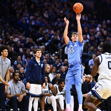 Mar 9, 2024; Philadelphia, Pennsylvania, USA; Creighton Bluejays guard Baylor Scheierman (55) shoots over Villanova Wildcats guard TJ Bamba (0) in the first half at Wells Fargo Center. Mandatory Credit: Kyle Ross-USA TODAY Sports