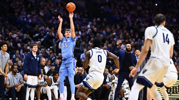 Mar 9, 2024; Philadelphia, Pennsylvania, USA; Creighton Bluejays guard Baylor Scheierman (55) shoots over Villanova Wildcats guard TJ Bamba (0) in the first half at Wells Fargo Center. Mandatory Credit: Kyle Ross-USA TODAY Sports