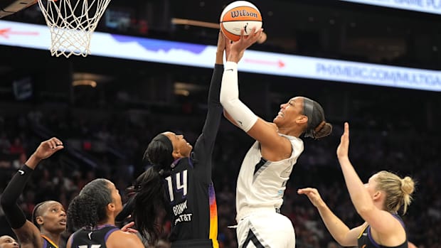A photo of A'ja Wilson shooting near the rim